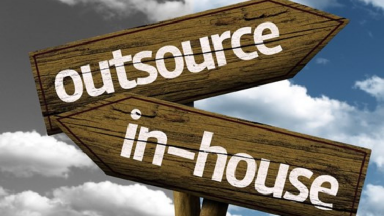outsource vs in-house roadsign