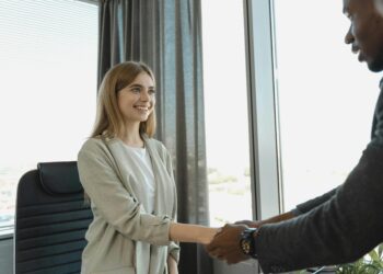 HR recruiter and candidate handshake