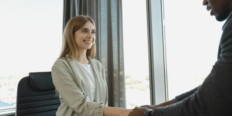 HR recruiter and candidate handshake